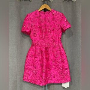 Pink halter top sequin dress.